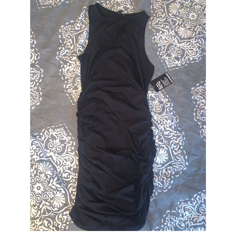 Black express dress with a slit in neck line!